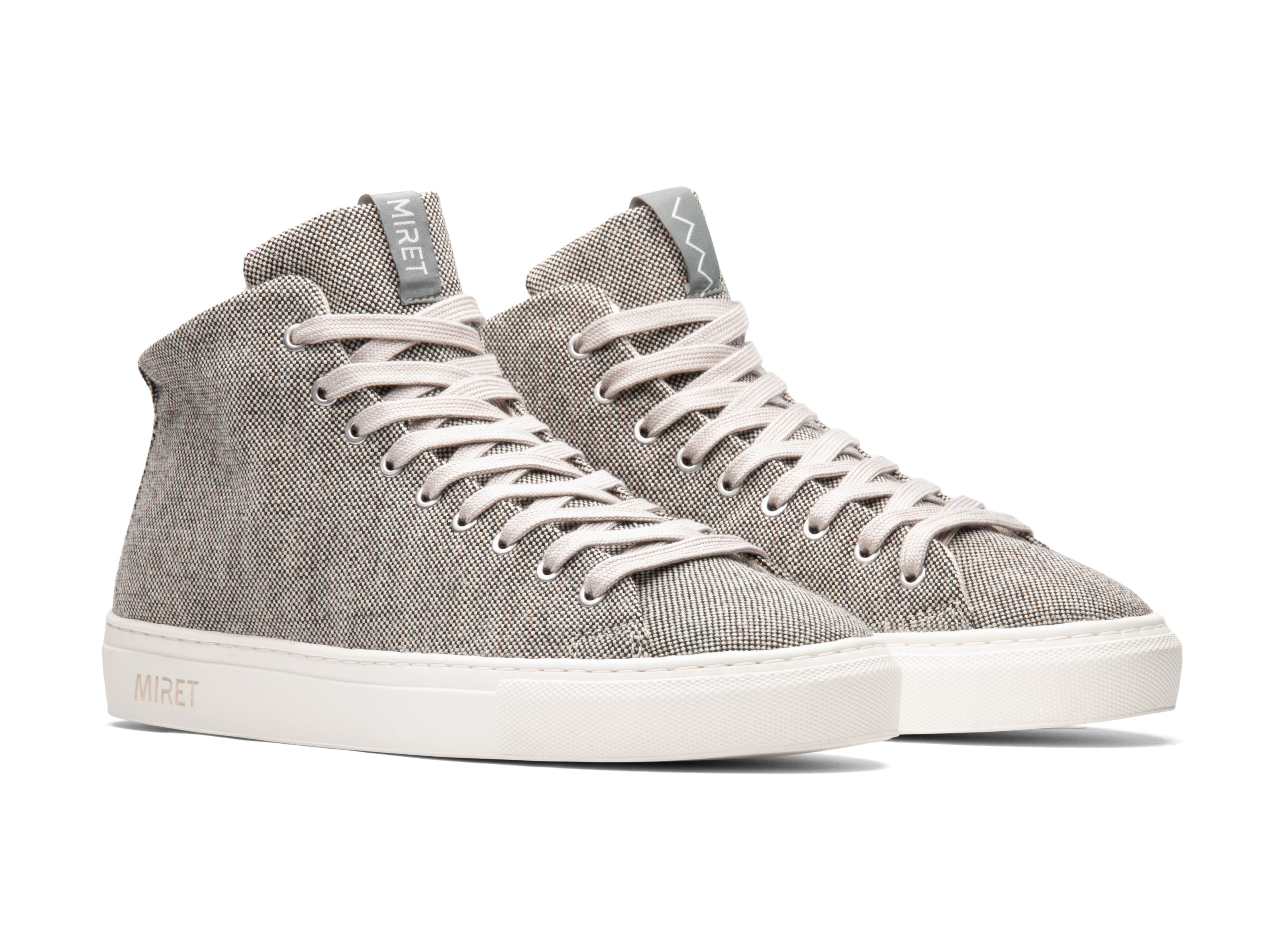 Mid-top natural sneakers for spring and summer in the color grey. Made from 100% unbleached and undyed thermoregulating wool with pure hemp lining, wool-covered cork insoles and natural rubber outsoles. OEKO-TEX certified sneakers manufactured in the EU. 