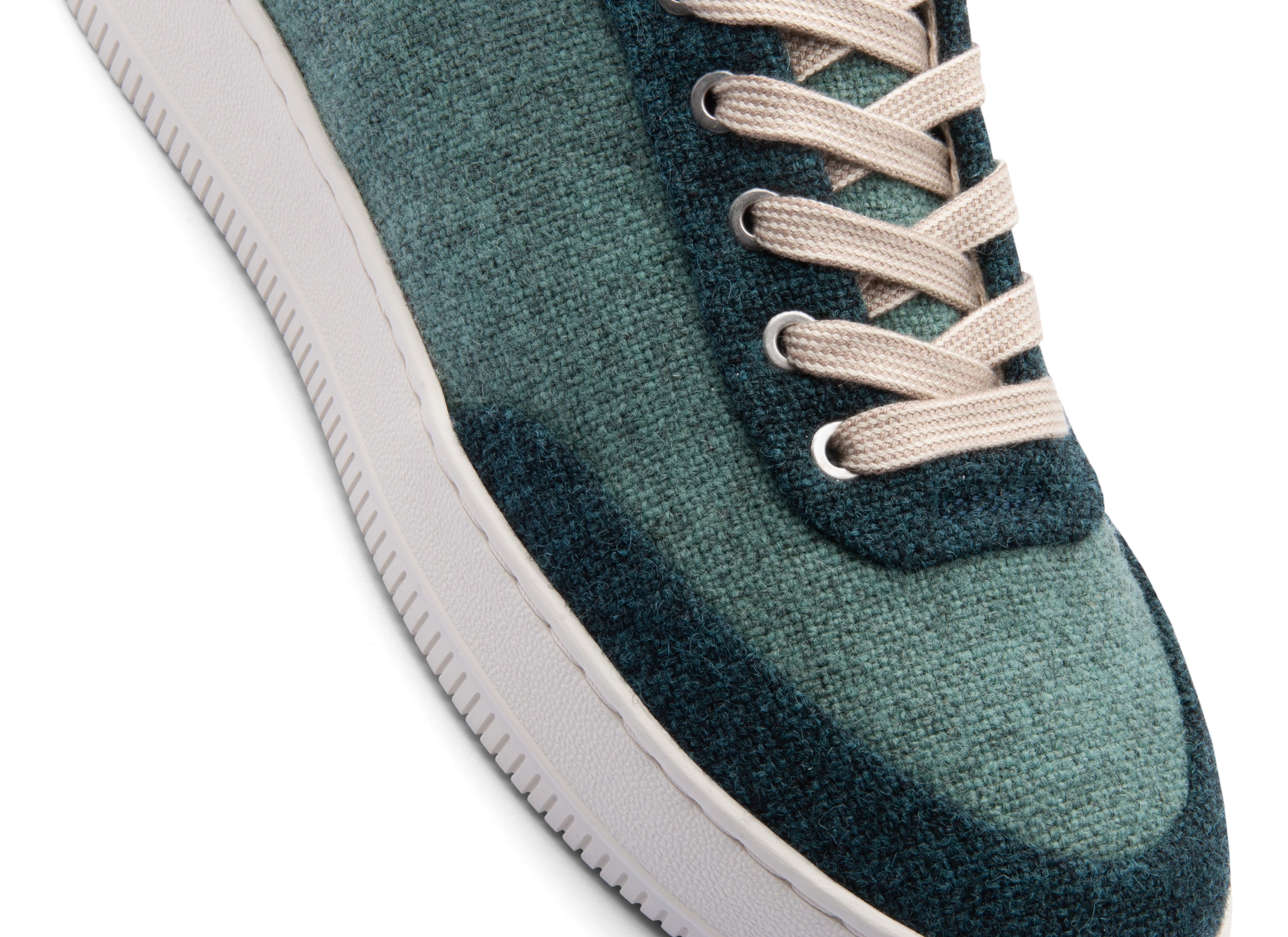 Low-top multicolored natural sneakers. Made from 100% thermoregulating and water-repellent wool with pure hemp lining, wool-covered cork insoles and super-flexible rubber outsoles. OEKO-TEX certified sneakers manufactured in the EU.